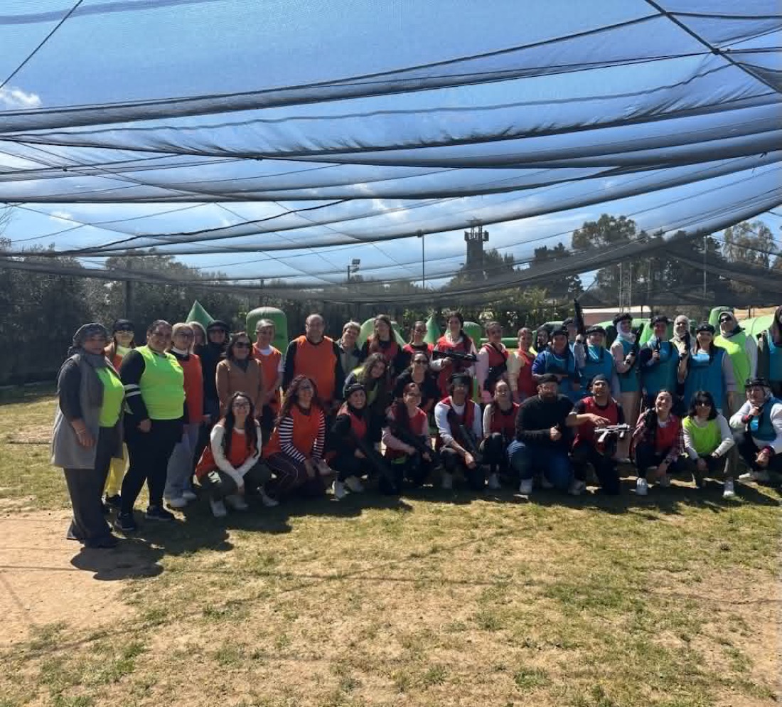 Mariam AlBatool staff together on a team day outdoors